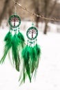 earrings of Dream catcher with feathers threads and beads rope hanging. Dreamcatcher handmade Royalty Free Stock Photo