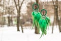 earrings of Dream catcher with feathers threads and beads rope hanging. Dreamcatcher handmade Royalty Free Stock Photo