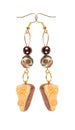 Earrings made of plastic in the form of the cake with lemon Royalty Free Stock Photo