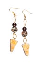 Earrings made of plastic in the form of the cake with lemon Royalty Free Stock Photo