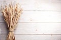 Ears of wheat on old wood. Royalty Free Stock Photo