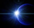 Earth against the sun in space Royalty Free Stock Photo