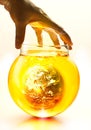 Earth burning in the bottle and yellow water boil under hand, Environment concept-Earth original image from NASA