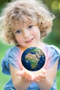 Earth in children`s hands