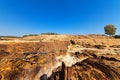 Earth dam wall with an empty dam