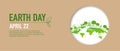 Earth Day banner of brown paper cut style and green city