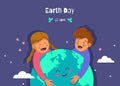 Earth Day holiday. Nature and ecology background. girl and boy hugging earth planet between hearts, stars. vector Earth Day Royalty Free Stock Photo