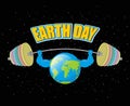 Earth Day. Strong planet and sports barbell. Powerful Earth doing exercises. Earth is pumped. Black outdoor space