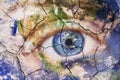 Earth extinction concept. Close up image of woman face with earth painted cracked texture with iris earth. Creative