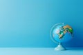 Earth globe on clean blue banner background. Education, school, study and knowledge background Generative AI. Royalty Free Stock Photo