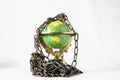 Earth globe close in chain. 3d...