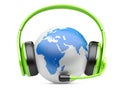 Earth globe with green headphones and microphone Royalty Free Stock Photo