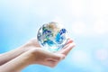 Earth globe in hands. Elements of this image furnished by NASA Royalty Free Stock Photo