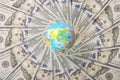 Earth globe on mandala kaleidoscope from money Royalty Free Stock Photo