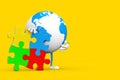 Earth Globe Person Character Mascot with Four Pieces of Colorful Jigsaw Puzzle. 3d Rendering