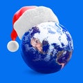 Earth globe and santa hat Royalty Free Stock Photo