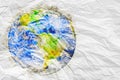 Earth globe with watercolor texture on crumpled paper Ecology c