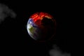 Earth halfway burning seen from outer space symbol of global warming or an apocalypse and disaster. Some elements Royalty Free Stock Photo