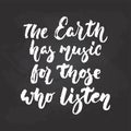 The Earth has music for those who listen - hand drawn Musical lettering phrase isolated on the black chalkboard