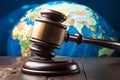 Earth held by a gavel wielding hand, portraying the concept of worldwide justice