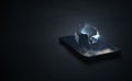 Earth hologram above smartphone screen Royalty Free Stock Photo