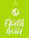 Earth hour - hand lettering. Light bulb with earth and clock. Vector.