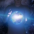 Earth hovers between mans hands Royalty Free Stock Photo