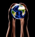 Earth in human hands - caring for the earth concept. with high details. Royalty Free Stock Photo