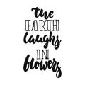 The Earth laughs in flowers - hand drawn lettering phrase isolated on the white background. Fun brush ink vector