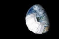 Earth in medical mask isolated on black background, concept of coronavirus in world and COVID-19 pandemic. Globe with protect from Royalty Free Stock Photo