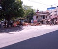 Earth mover parked across as a road barrier to prevent people moving in pandemic times