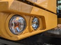 earth moving machine's headlamp lights Royalty Free Stock Photo