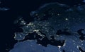 Earth at night, view of city lights showing human activity in Europe and Middle East from space. World dark map on global Royalty Free Stock Photo