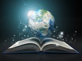 Earth and open book. Education internet e-'learning concept. Royalty Free Stock Photo