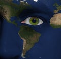 Earth painted on face with green eye Royalty Free Stock Photo