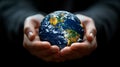Earth in palms: Business concept, miniature globe, global strategy. Royalty Free Stock Photo