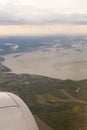 Earth and plane wing view Royalty Free Stock Photo