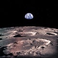 Earth rises above lunar horizon