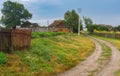 Earth road between streets in Boromlya village, Sumskaya oblast, Ukraine Royalty Free Stock Photo