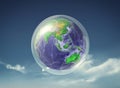 Earth into a bubble protection against the virus . Royalty Free Stock Photo