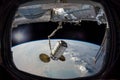 Earth in spaceship window porthole. Dust storm clouds