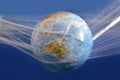 The earth is suspended in a plastic plastic disposable packaging, on a blue background. The concept of environmental pollution by