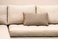 Earth tones color pillow and brown cushion fabric sofa interior for home and living achitecture decoration contemporary Royalty Free Stock Photo