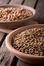 Earthen bowls with lentils and chickpeas