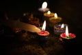 Earthen diya lamp lighting with candles on the occasion of diwali and sandhi pujo Royalty Free Stock Photo