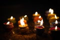 Earthen diya lamp lighting with candles on the occasion of diwali and sandhi pujo Royalty Free Stock Photo