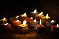 Earthen diya lamp lighting with candles on the occasion of diwali and sandhi pujo Royalty Free Stock Photo