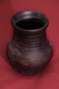 Earthen jar made by hand on pottery wheel Royalty Free Stock Photo