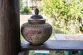 Earthen jar. Thailand in ancient times,earthen jar filled with water placed in front of a home