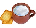 Earthen jug of milk with cookies